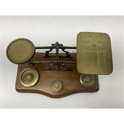 Set of brass postal scales, on wooden base