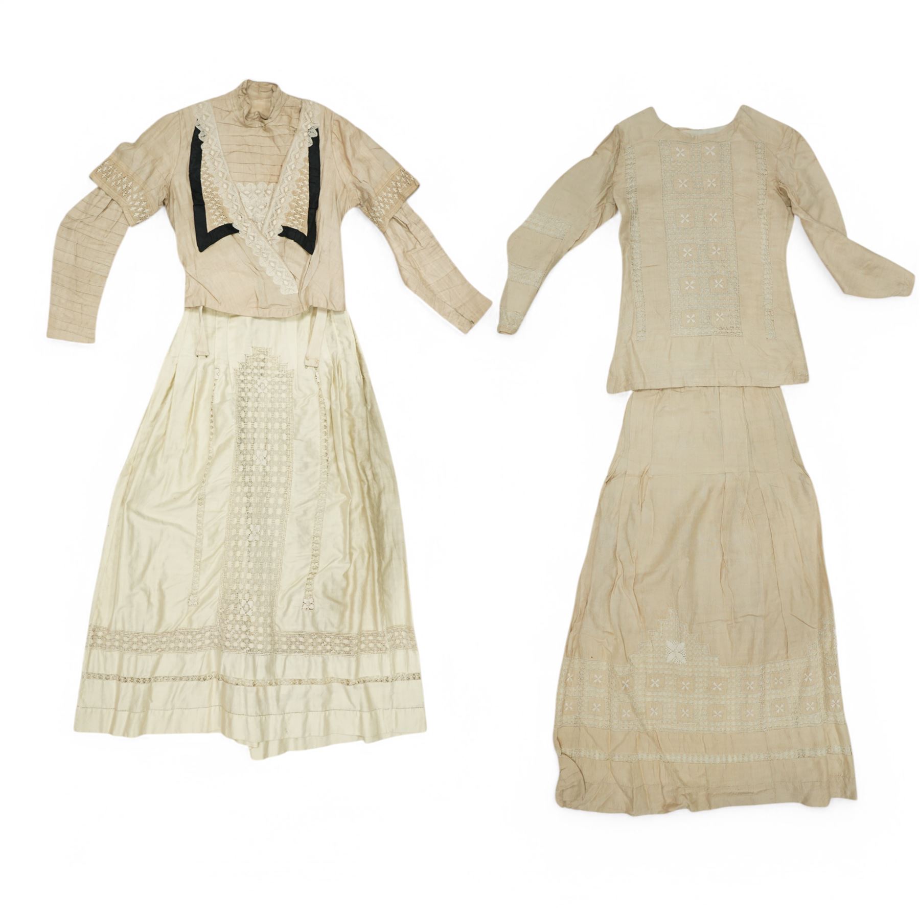 Two Edwardian childrens or ladies bodices and skirts, in cream with panels of contrasting  lace detailing (2)