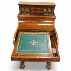 Victorian figured walnut piano top Davenport desk, hidden compartment lifting to reveal small drawers and pigeonholes, the piano lid enclosing drawers and sliding top with hinged leather writing surface, the right-hand side fitted with four drawers, on compressed bun feet 