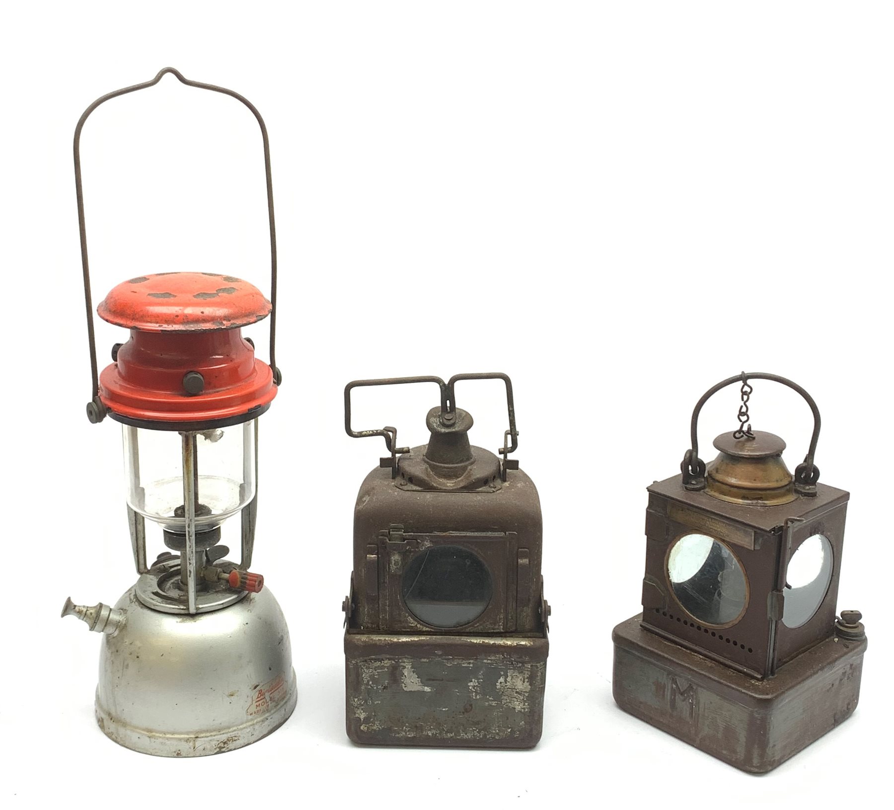  Welch Patent railway lamp by Lamp Manufacturing and Railway Supplies Ltd. bearing LMS plaque H23cm, another railway lamp of bow-fronted form by the same maker and Bialaddin Model 315 pressure lantern (3)  