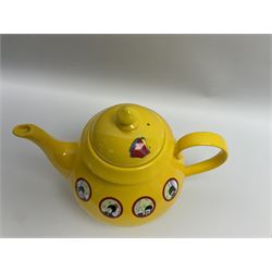 Limited edition Beatles Yellow Submarine teapot, designed by Paul Smith and made for Thomas Goode, 4/200, together with matching egg cups, 25/200, both in original boxes. 