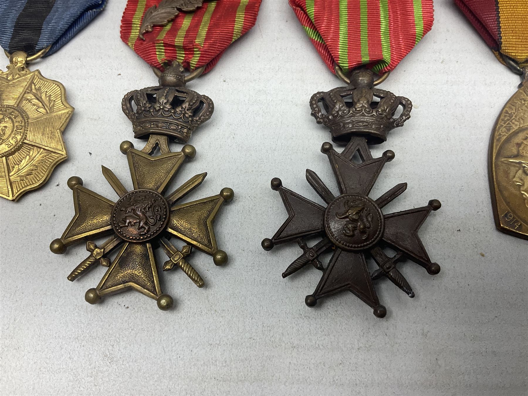 Five WW1 Belgian medals two CroixDeGuerre, one with MID leaves, L