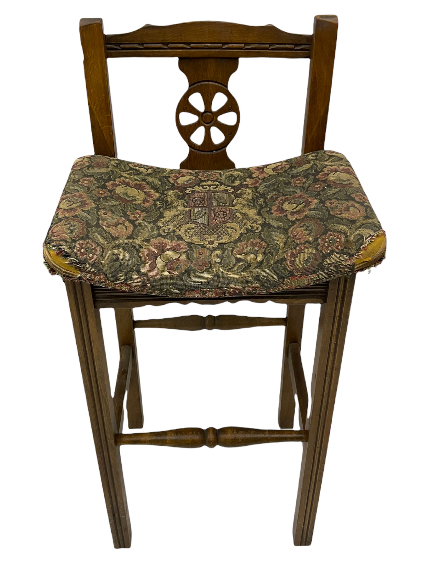 Old Charm - canted oak drinks bar, arched apertures set with mottled and bullseye colour glass panes, and three stools