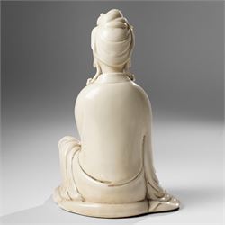 Three Chinese blanc de chine figures, each depicting Guanyin seated, Dehua province, two with double gourd and potters seal marks to the reverse 