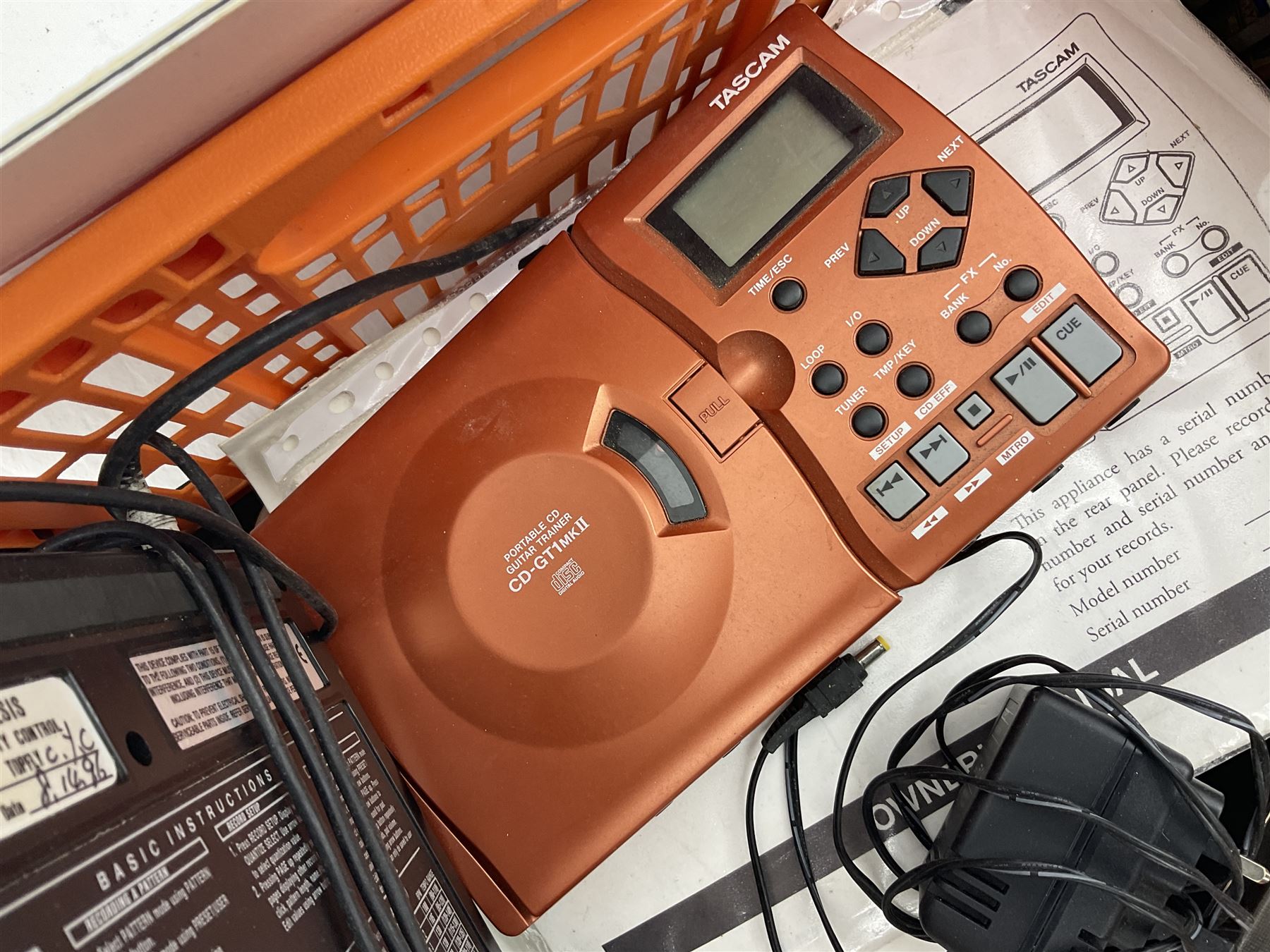 Alesis SR-16 drum machine, Neewer 48V phantom power supply, microphone stand, Genexxa microphone, quantity of jack to jack cables and other similar items