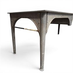 Large galvanised steel industrial or work table, rectangular top over tapering supports, stamped APVO
