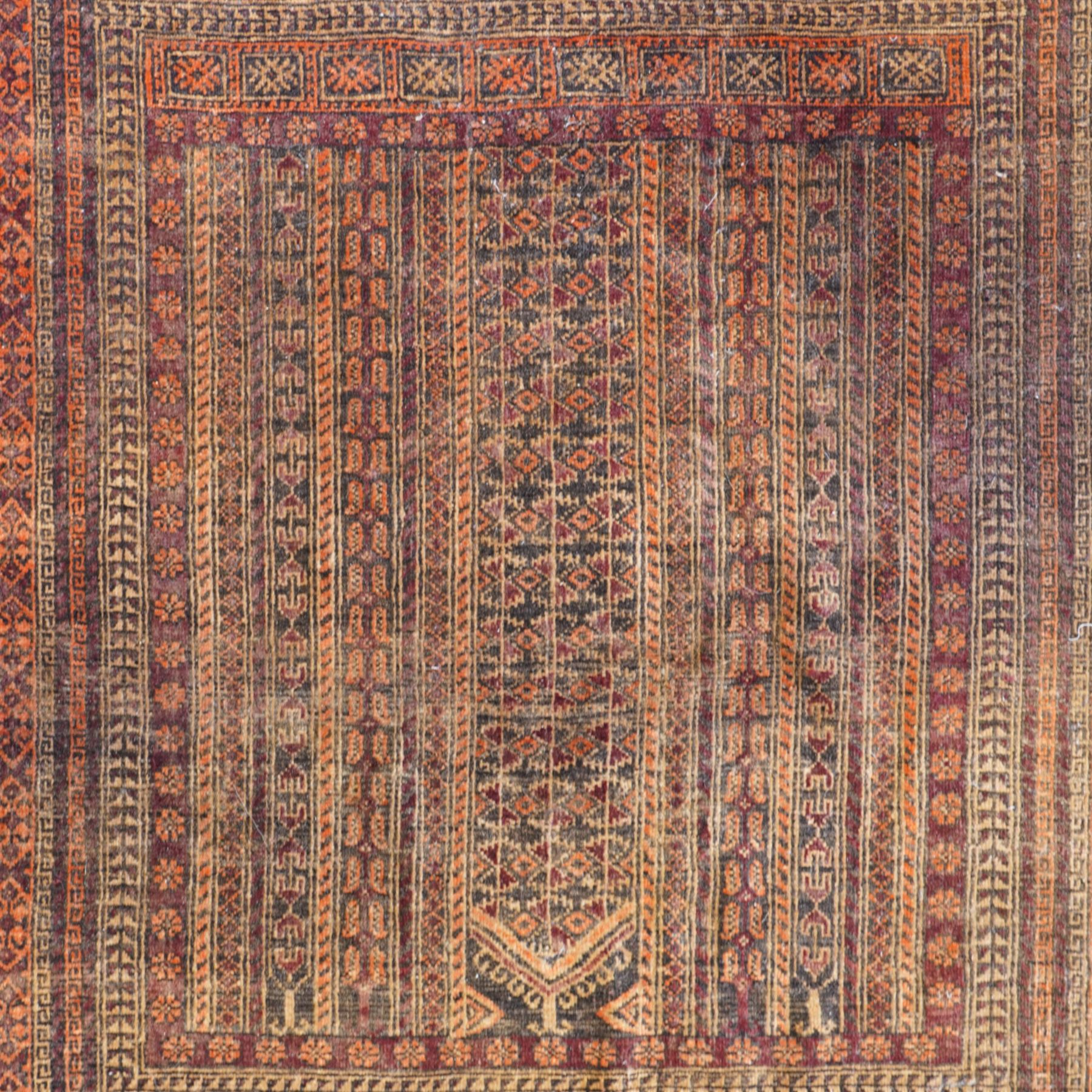 North West Persian Baluch prayer rug, central pointed mihrab design,    dark brown and camel tones, with repeating geometric and stylised floral motifs, lower field with tree of life motifs, main border geometric vine pattern in alternating colours, narrow guard stripes with repeating small motifs 
