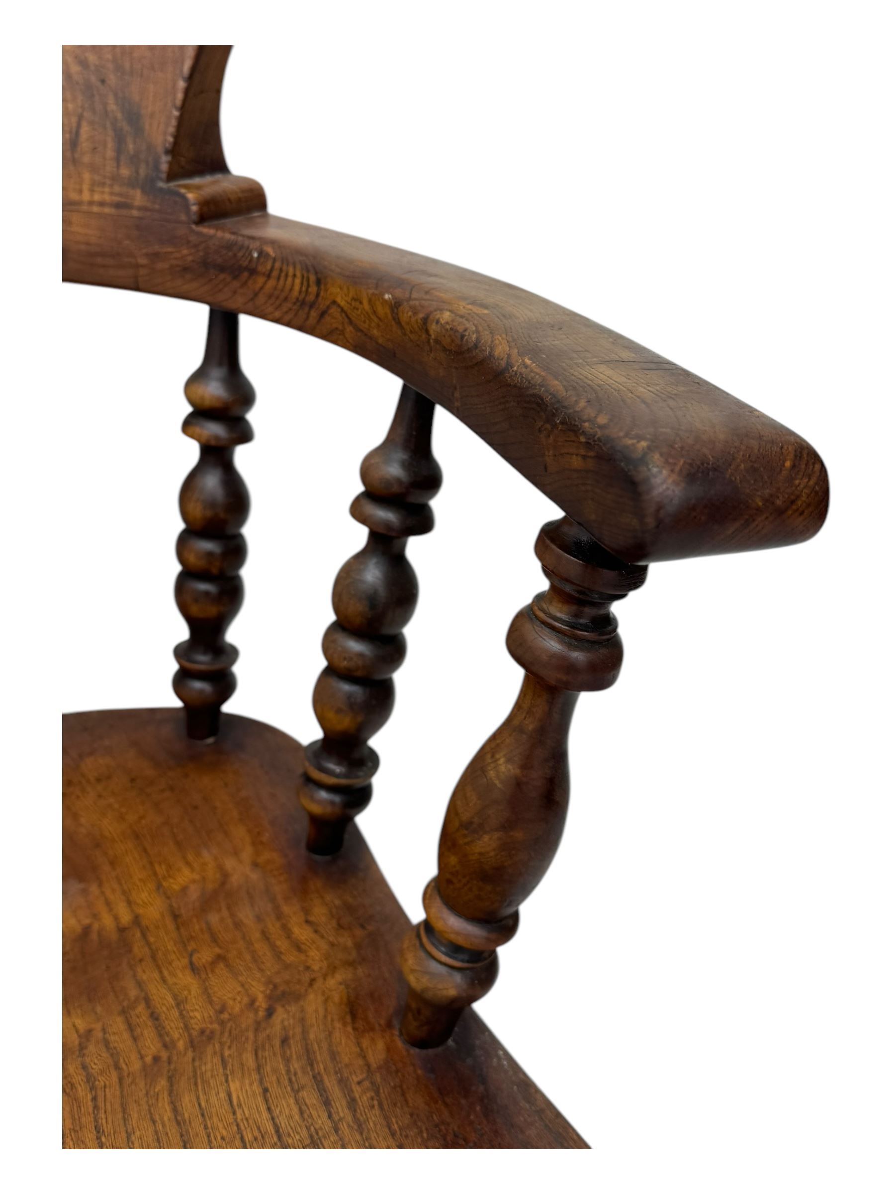 Victorian elm captains smokers bow chair, spindle turned tub shaped back, saddle seat, seat height 41cm