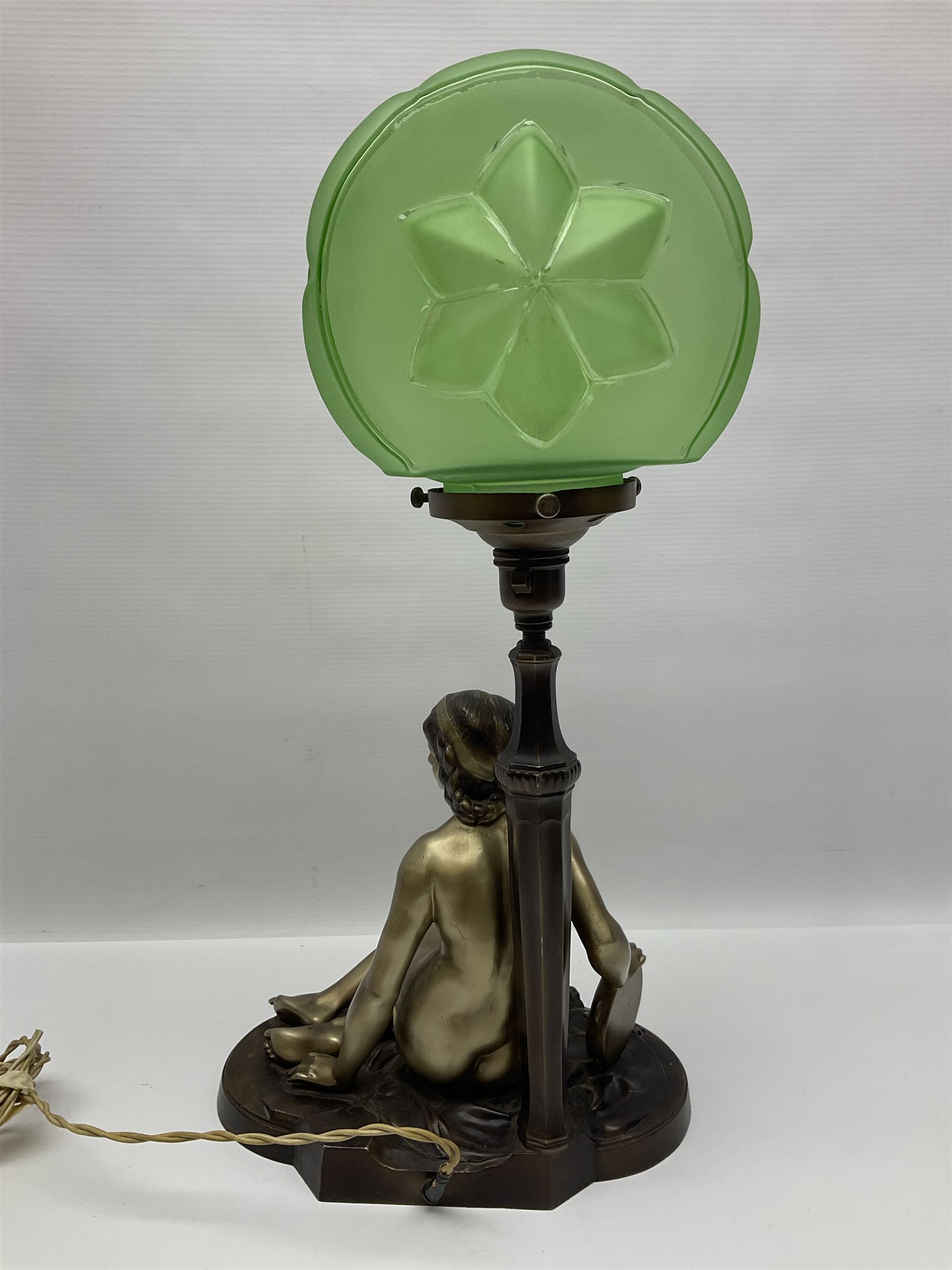 Art Deco style bronzed and gilded spelter figural table lamp with green Uranium glass shade; H48cm, another table lamp; and a bisque group