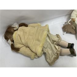 Two Zapf Creation limited edition designer collection dolls, by Brigette Paetsch, the first example with faux suede jacket, red jumper and denim skirt, no. 460, the second example 'Linda' in white dress with teddy bear accessory, no. 785, each signed B Paetsch, tallest L60cm