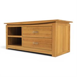 Contemporary light oak television or media unit, two drawers and two open shelves, with apertures for wires