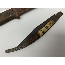 19th century continental folding knife with 15.5cm single edged blade, the pierced brass and iron handle with remains of horn grips L21.5cm overall closed; turned horn handled knife with foliate engraved blade; battlefield relic German 1884/98 knife bayonet; iron spear head; leather covered swagger stick; and two-piece gun cleaning rod