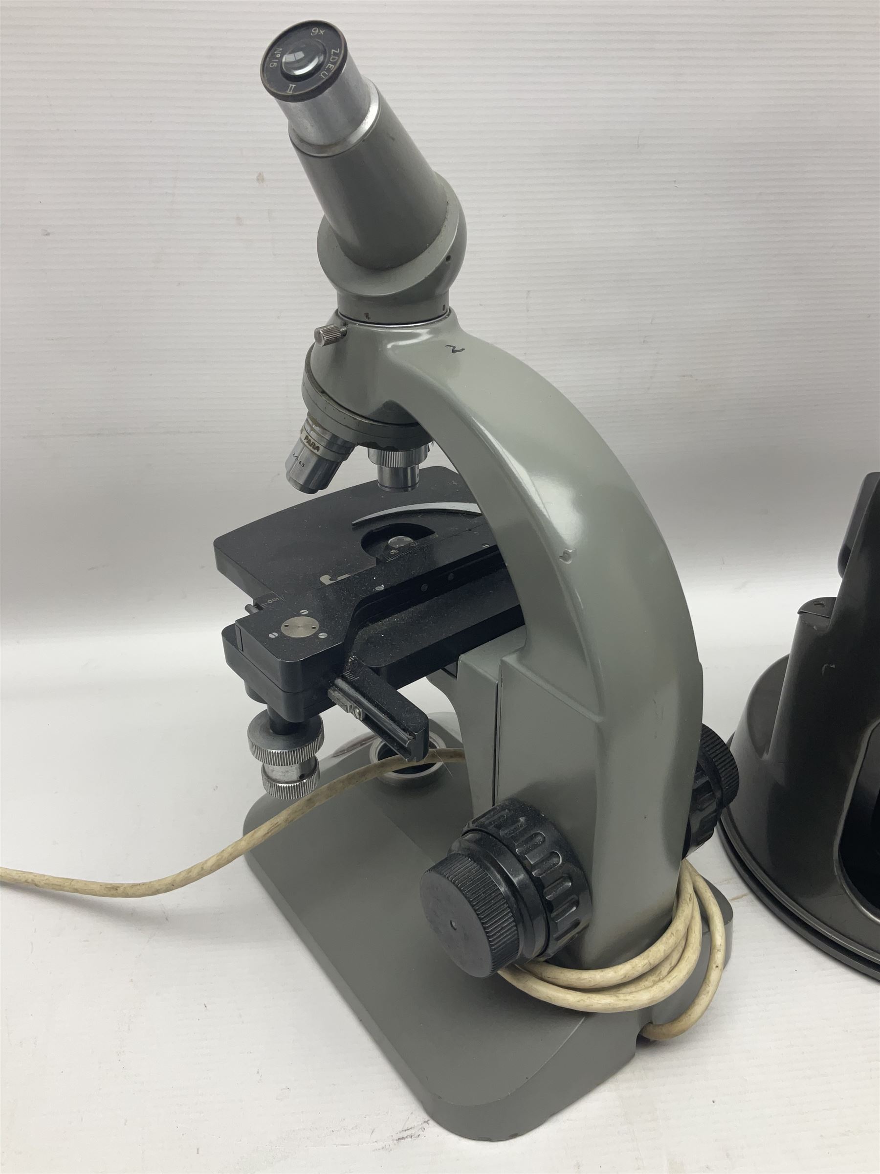 Four microscopes, comprising C Baker London Vickers, Back Diamax no 40956, Opax ABF no 232733 and one other 