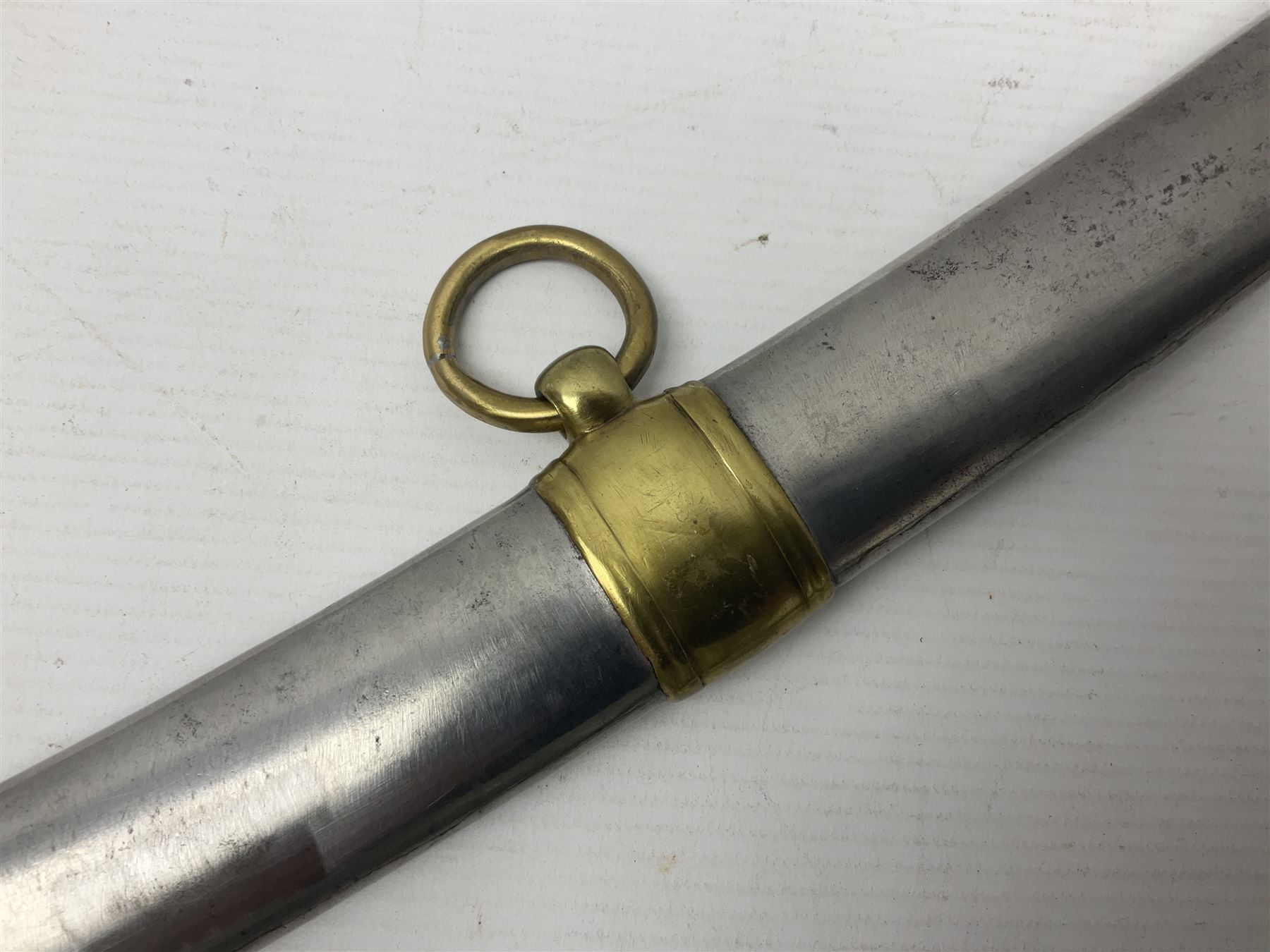 Early 19th century French Lancers officer's sword c1810, the 84cm curving fullered blade retaining most of its bluing, gilding and engraved decoration, inscribed I.S.& C. to ricasso (for Schimelbusch), brass three-bar hilt with elongated elliptical langets and wire-bound leather grip; in polished steel scabbard with two brass suspension rings L100cm overall