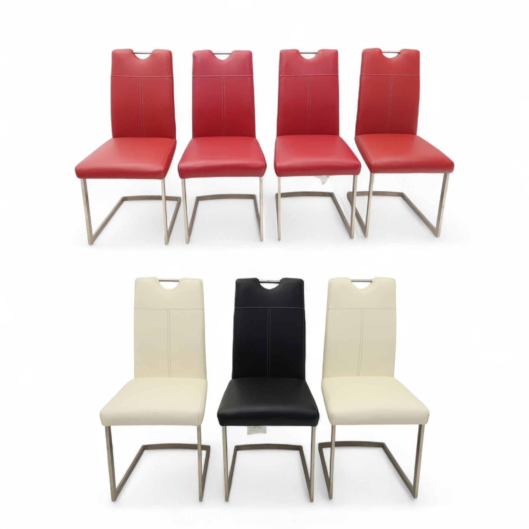 Set of seven contemporary style dining chairs, each with a high padded back and seat upholstered in faux leather on brushed steel sled bases  