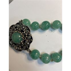 Chinese jade bead necklace with silver open work clasp with a cabochon greenstone/possibly jade bead necklace, signed Liu with Chinese character marks