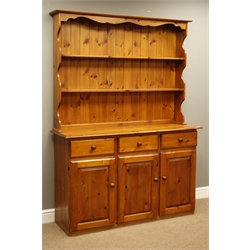  Polished pine kitchen dresser, three drawers and thee cupboards, raised two tier plate rack, W137cm, H187cm, D42cm  