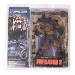 Three McFarlane Toys Movie Maniacs Alien and Predator action figures, comprising Alien Resurrection Warrior Alien, Predator 2 Predator the Hunter and Aliens Colonial Marine CPL Hicks, all carded