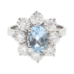 18ct white gold oval aquamarine and round brilliant cut diamond cluster ring, hallmarked, aquamarine 1.30 carat, total diamond weight approx 1.60 carat
