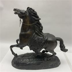 Bronzed figure of a galloping horse, upon a naturalistic base, H35cm