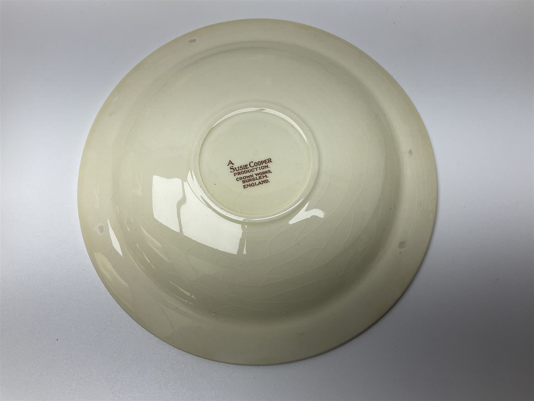 Susie Cooper Nosegay pattern tea service, teapot, eight cups and saucers, six dessert plates, three graduating jugs, covered twin handled sucrier, open sucrier  and cake plate 