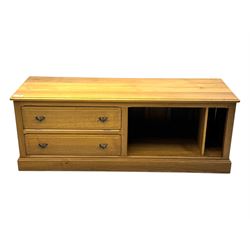 Contemporary oak television media cabinet, rectangular top with moulded edge, fitted with two long drawers beside two open compartments, on plinth base