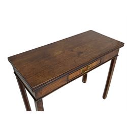 George III mahogany tea or side table, fold-over top over single gate-leg action base, fitted with single cock-beaded drawer, raised on square supports with inner chamfer