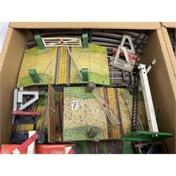 '0' gauge - assorted track and trackside accessories including right angle and acute crossings, points, turntables, buffer stops, level crossings, signals etc; some boxed; and small quantity of three-rail track; in three boxes