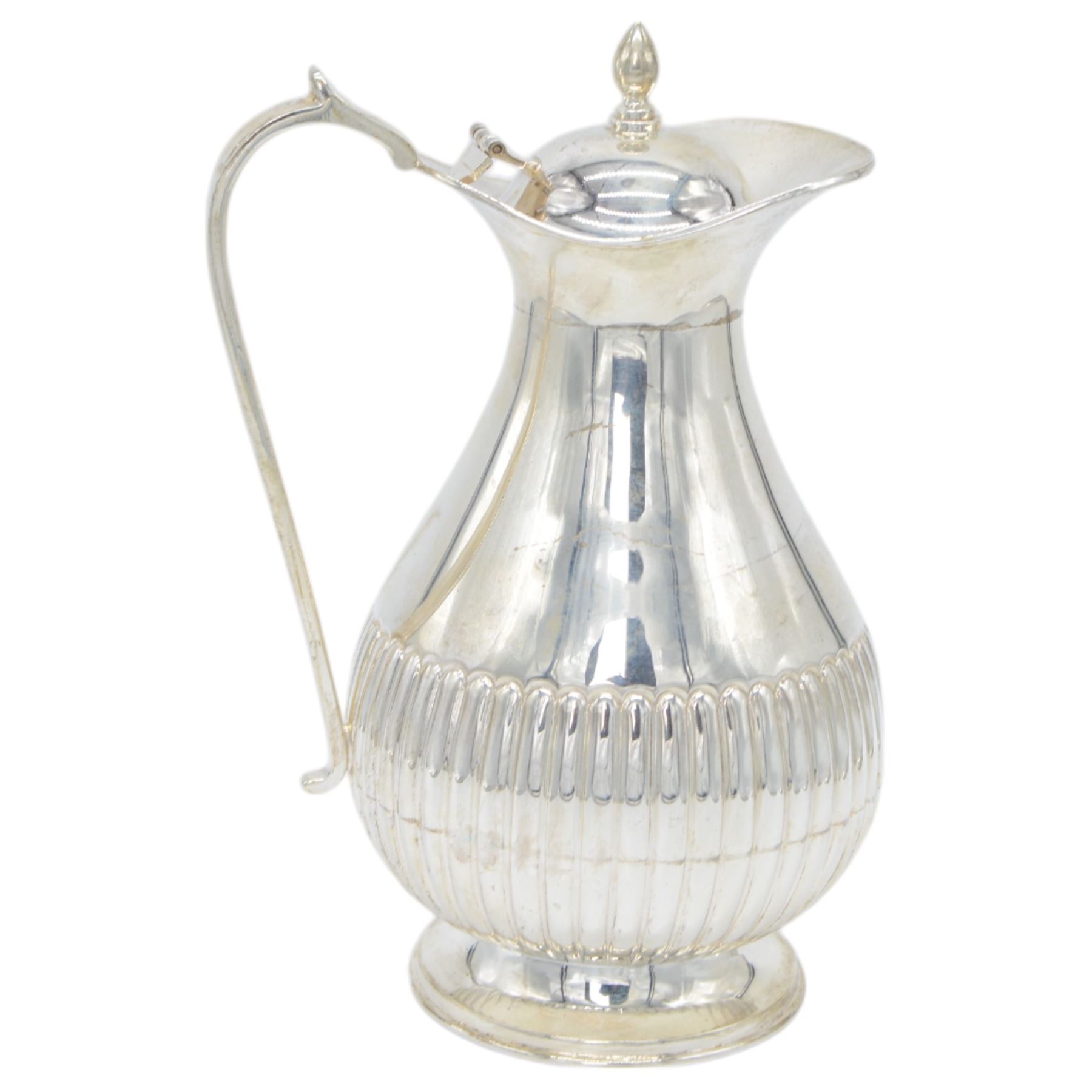 Late 20th century Indian Colonial silver six piece tea and coffee service, comprising coffee pot, hot water pot, teapot, milk jug, open sucrier and tray, all of oval part fluted form, the tea and coffee pot with ebonised wooden handles and finials, stamped SIL and with maker's mark for Cooke & Kelvey New Dehli, within two boxes and with original receipt for 1999