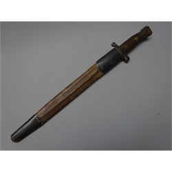  British Bayonet, 30.5cm steel blade with wooden slab grip, L42.5cm, in leather and steel scabbard  