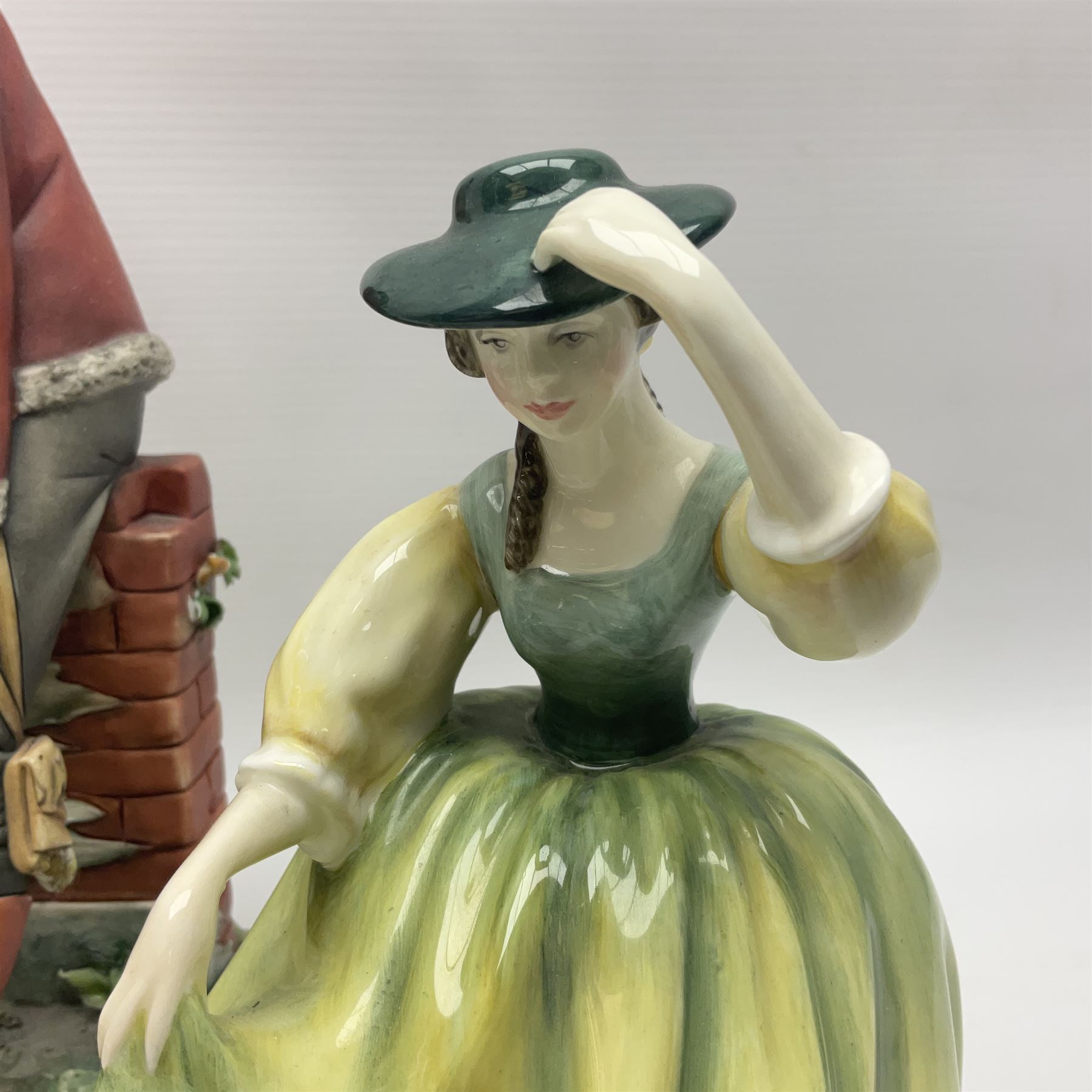 Two Royal Doulton figures, Buttercup HN2309 and Ascot HN2356, together with Capodimonte figure Hussar and His Lady 