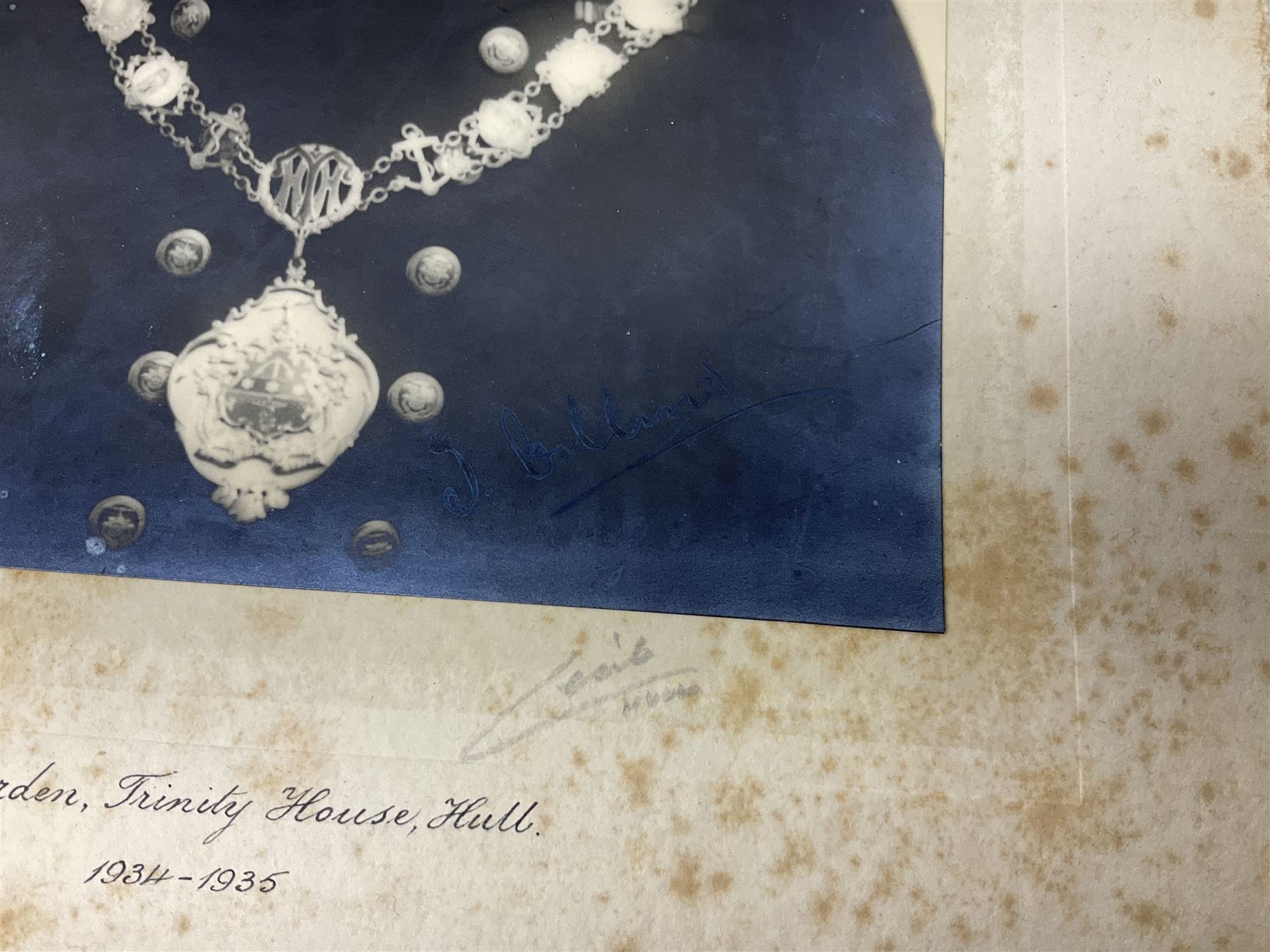 Trinity House Hull - hallmarked silver medal commemorating the visit of the Prince of Wales October 13th 1926; photograph of Captain J. Collins Warden 1934-35; photographic postcard of Capt. Collins onboard ship with other crew members; and six Trinity House uniform buttons