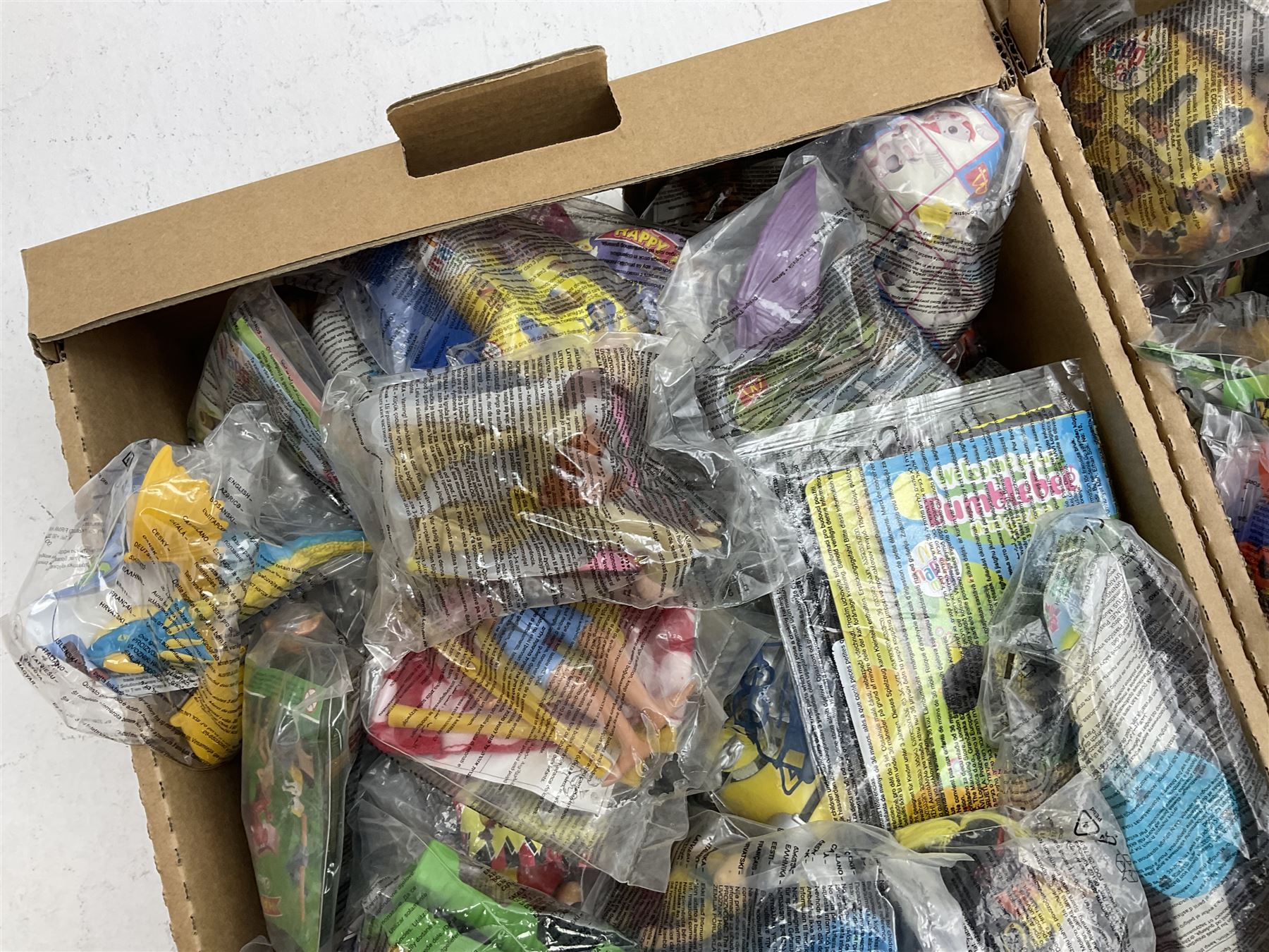 Large quantity of Mcdonalds toys to include Mario in three boxes
