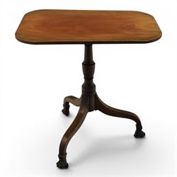 George III mahogany tripod table, rounded rectangular tilt top, raised on a turned column, on splayed supports, terminating brass claw feet above castors