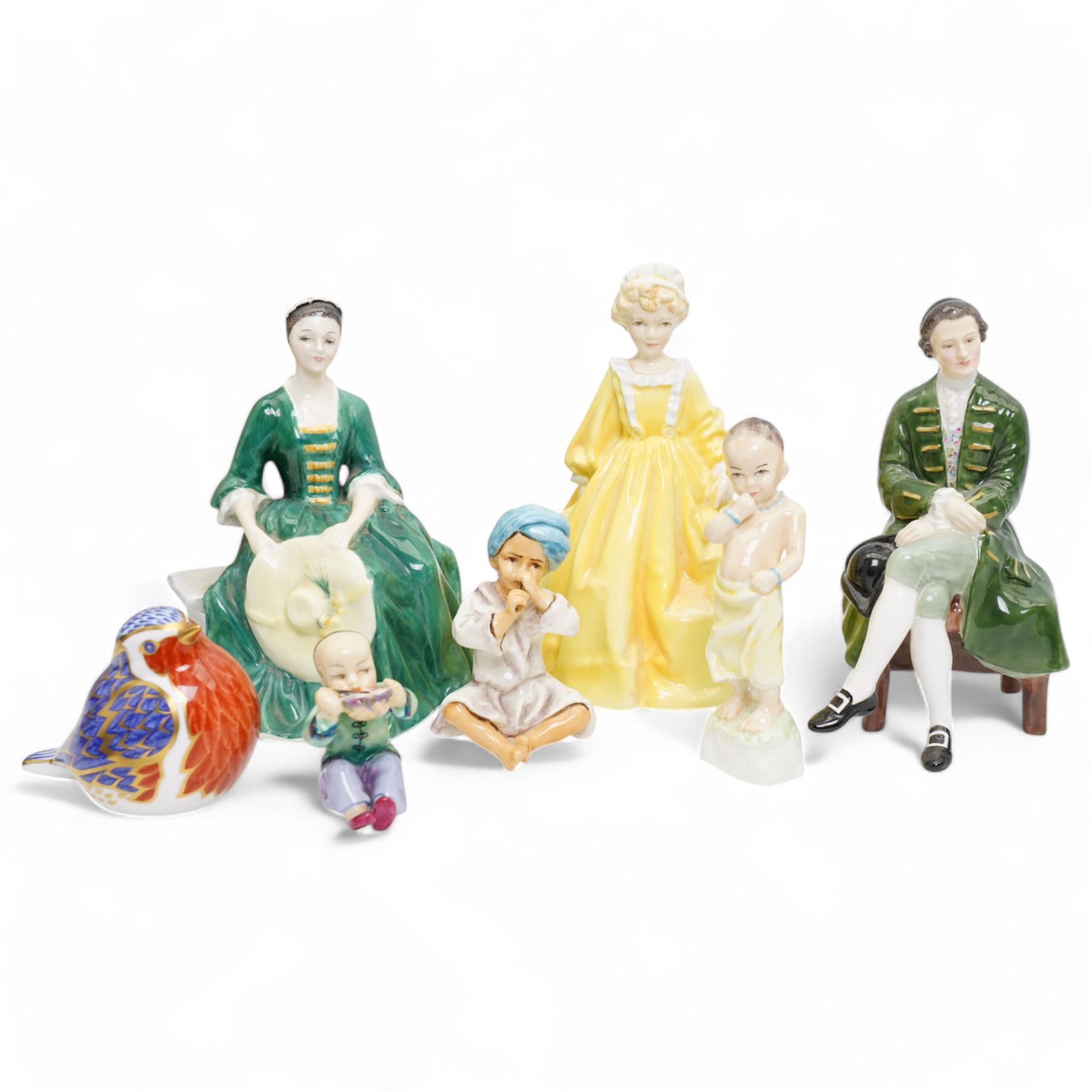 Royal Crown Derby Robin paperweight, Three Royal Worcester figures by FG Doughty including Burma 3068, India 5071 and China 3073 and two other Royal Doulton and Royal Worcester ladies (7)