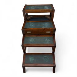 In the manner of Morgan & Sanders - early 20th century Regency design mahogany metaphoric library chair and steps, rectangular panelled top-rail with applied roundels with scrolling arms and upholstered seat and cushion, hinged and folding design transforming into four carpeted steps

Reference: The present lot is based on a design for a metamorphic library chair published by Morgan & Saunders circa 1810, P.Agius, Ackermann's Regency Furniture & Interiors, plate 29, page 60