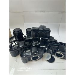 Six Minolta Dynax SLR camera bodies, comprising 800si serial no. 62703606, three 7xi examples, including one boxed example, serial nos. 20106944, 16123311 & 22107553, and two 9xi examples, serial no. 18209901 & 18202113, with three Minolta lenses, including Zoom xi 28-105mm 1:3.5(22)-4.5 lens, AF Zoom 28-85mm 1:3.5 (22)-4.5 lens and an AF Zoom 75-300mm 1:4.5(32)-5.6 lens, Hama carry case and other accessories