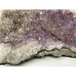 Amethyst crystal geode cluster, with well-defined crystals of various sizes, H13cm, L46cm
