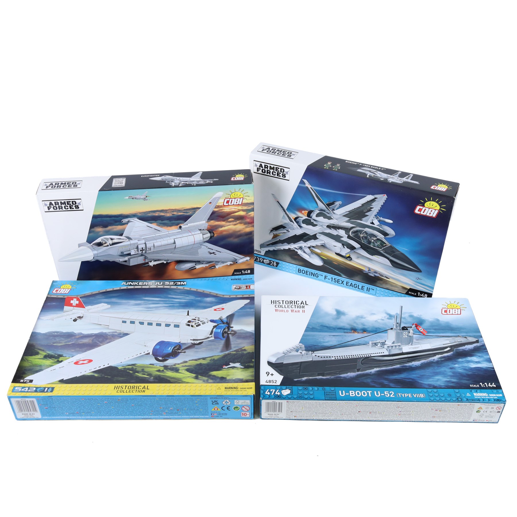Four Cobi Bricks Armed Forces and Historical Collection model sets, comprising 1:144 scale no. 4852 U-Boot U-52 (Type VIIB), 1:48 scale no. 5900 Boeing F-15EX Eagle II, 1:48 scale no. 5848 Eurofighter and no. 5711 Junkers JU 52/3M, all in sealed boxes