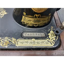 Cased early 20th century Singer hand sewing machine, lacking key