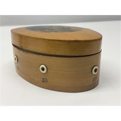 Six sewing related Mauchline ware comprising an oval reel box with internal label for Clark & Co's, tape measure, pin case and three thimble holders of ovoid form 