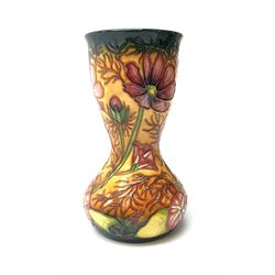 A Moorcroft vase, circa 2000, decorated in the Cosmos pattern, with impressed and painted marks beneath, H18cm. 