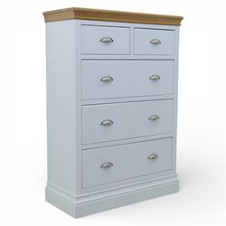 Modern chest of two short and three long drawers in white finish with oak moulded top, wit...