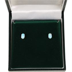 Pair of 9ct gold opal earrings, boxed