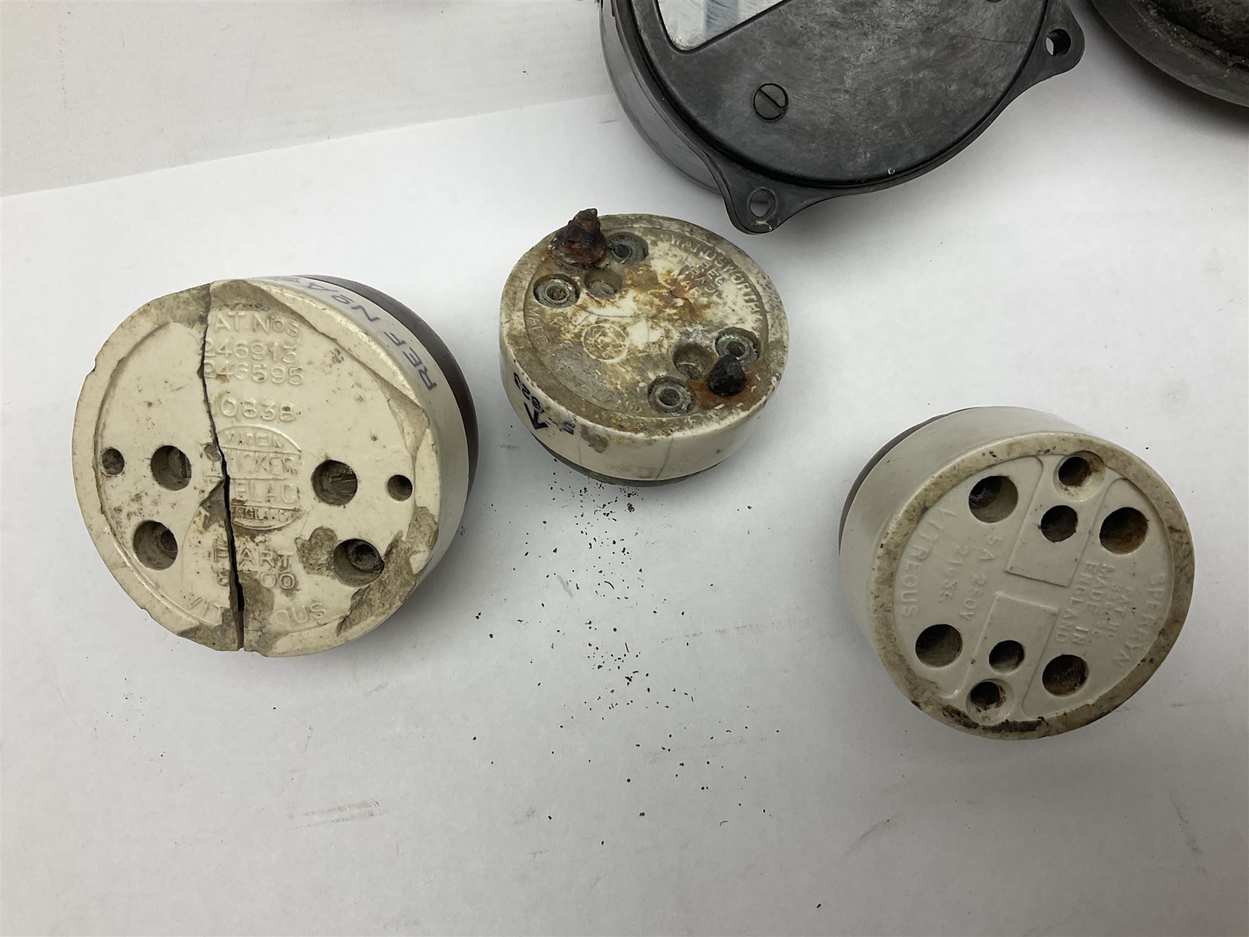 Three RAF light switches, together with military oxygen canister, batteries, gages etc  