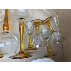Set of twelve wine glasses with amber stems, four further smaller similar, together with collection of Losol Ware blue and white dinner wares and other ceramics and glassware in two boxes