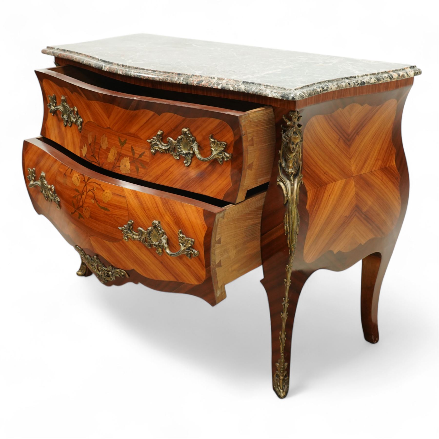 French Louis XV revival bombe commode, early 20th century, with variegated marble top above two drawers inlaid with floral marquetry, gilt metal rococo handles and mounts, kingwood and tulipwood veneers laid in chevron and quartered patterns, on cabriole supports with gilt sabots