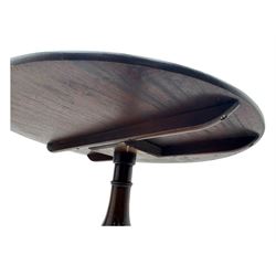 19th century mahogany tilt-top occasional table, circular top on a turned baluster column, raised on three splayed supports