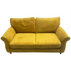 Next Furniture - traditional shaped three-seat sofa, upholstered in mustard velvet, rolled arms with pipping, on turned front feet
