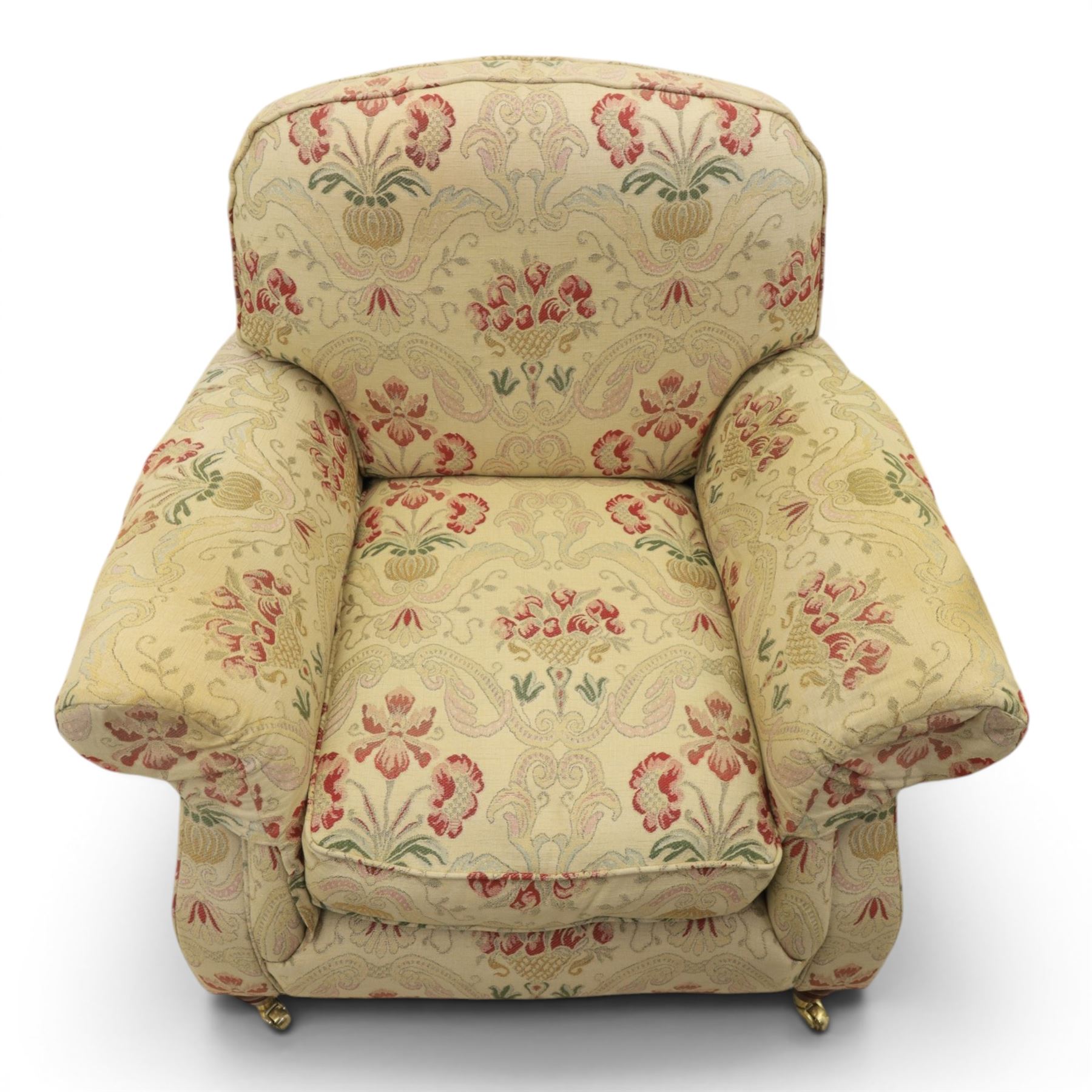 Parker Knoll - 'Henley' floral fabric living room suite, comprising a two seat sofa and pair of armchairs, raised on dark stained turned feet raised on brass castors

Armchairs (H 99cm, W 95cm, D 100cm)